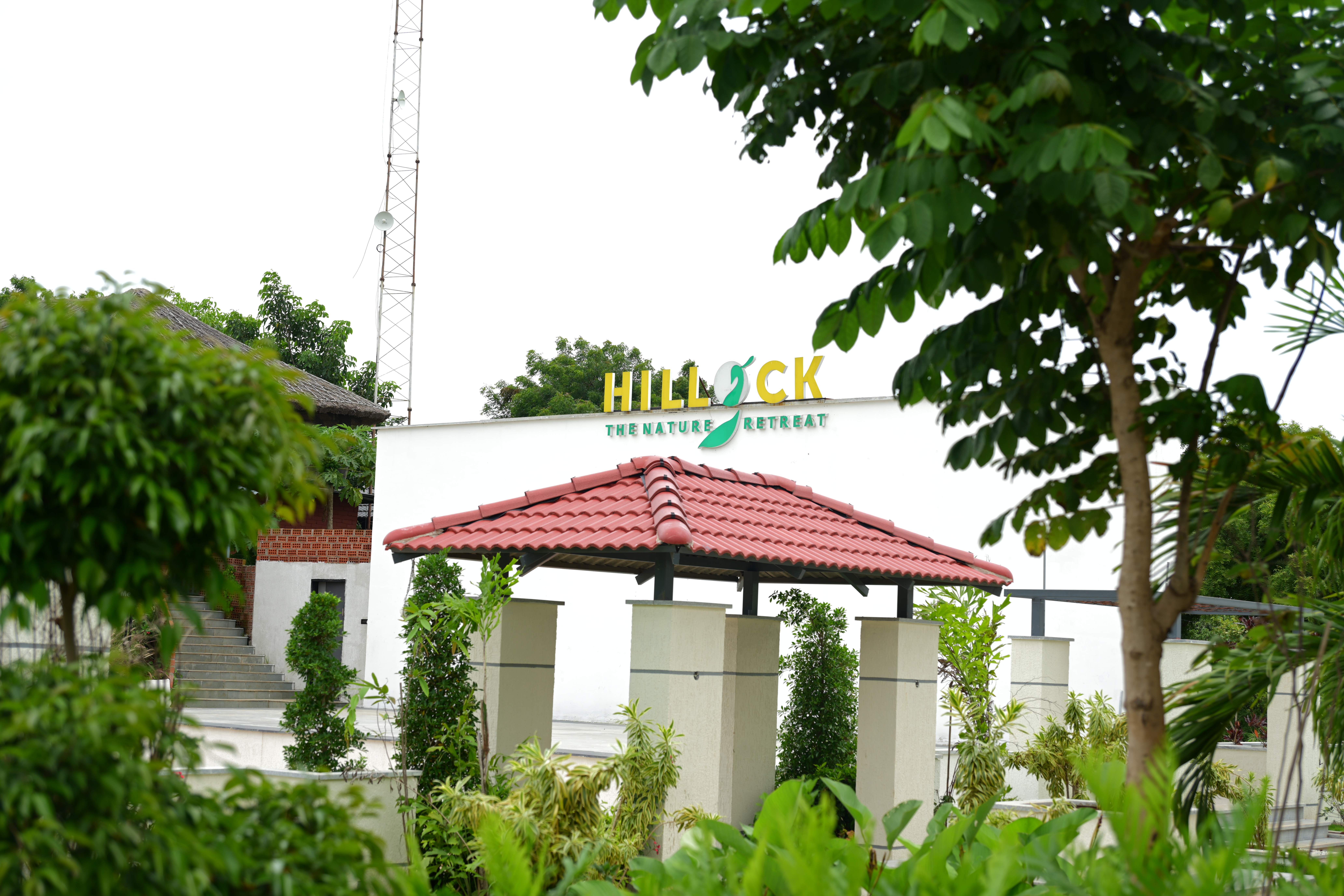 The Hillock Resorts Nature Retreat Sign